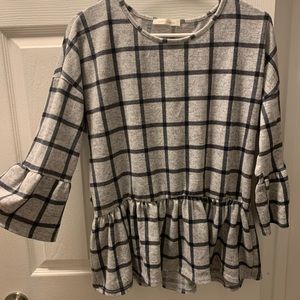 Window pane peplum shirt